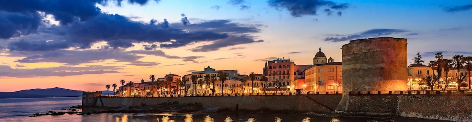 Sunset over Alghero coastline
